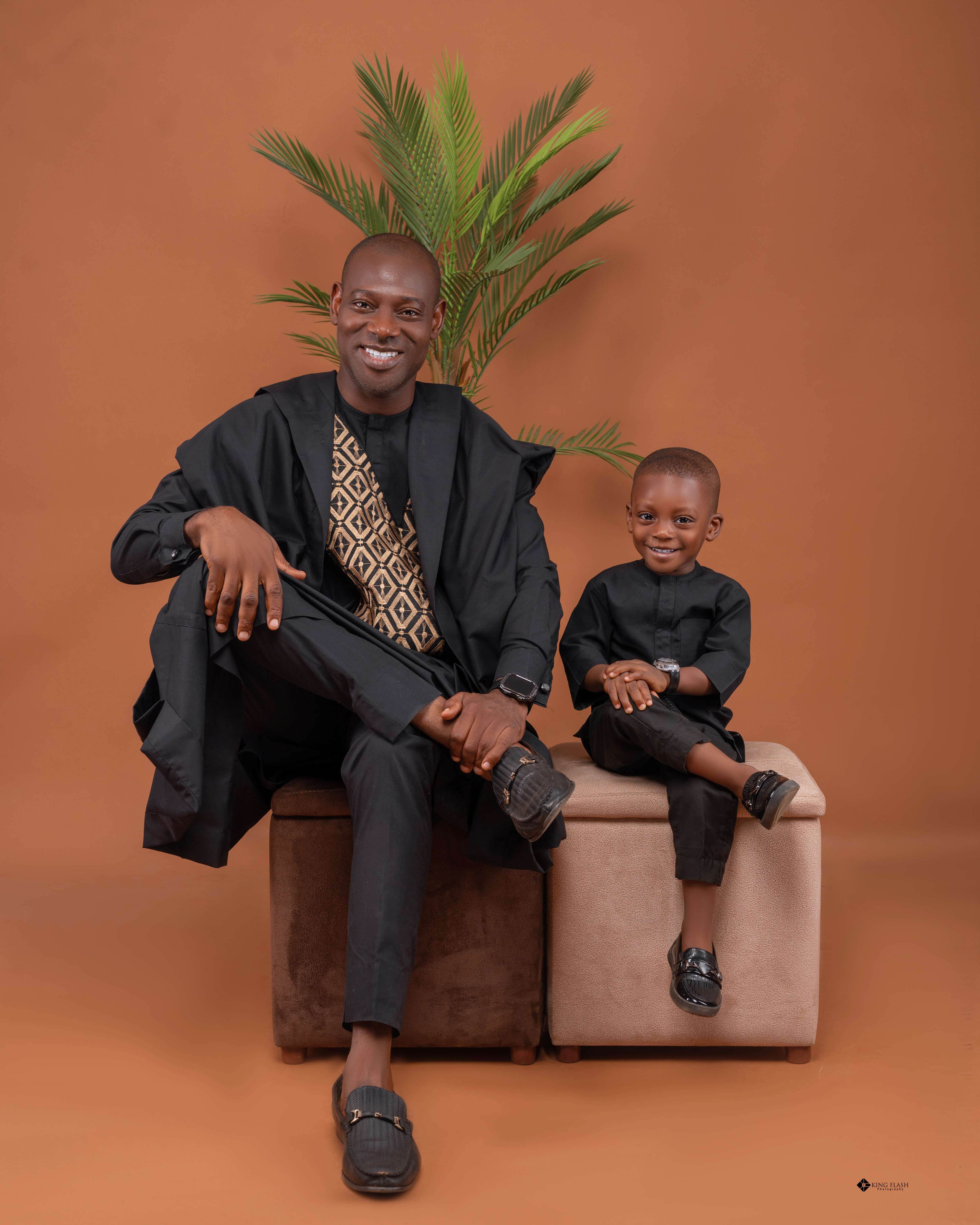 Dr. Kayode Femi and son Adeogo sharing a joyful moment